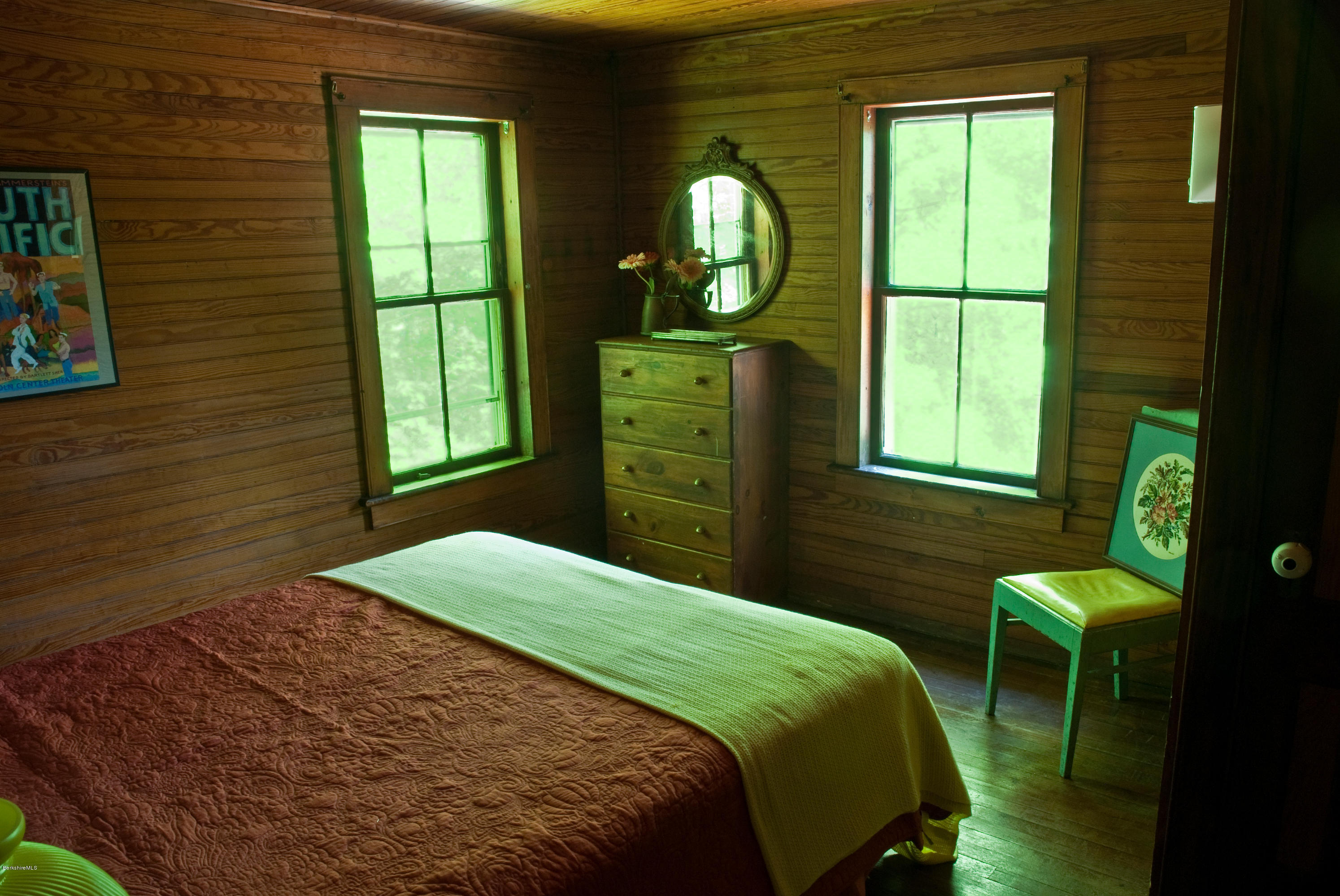 22 Bidwell Road Monterey, MA 01245 - Photo 23 of 46 a bedroom with a bed and a window