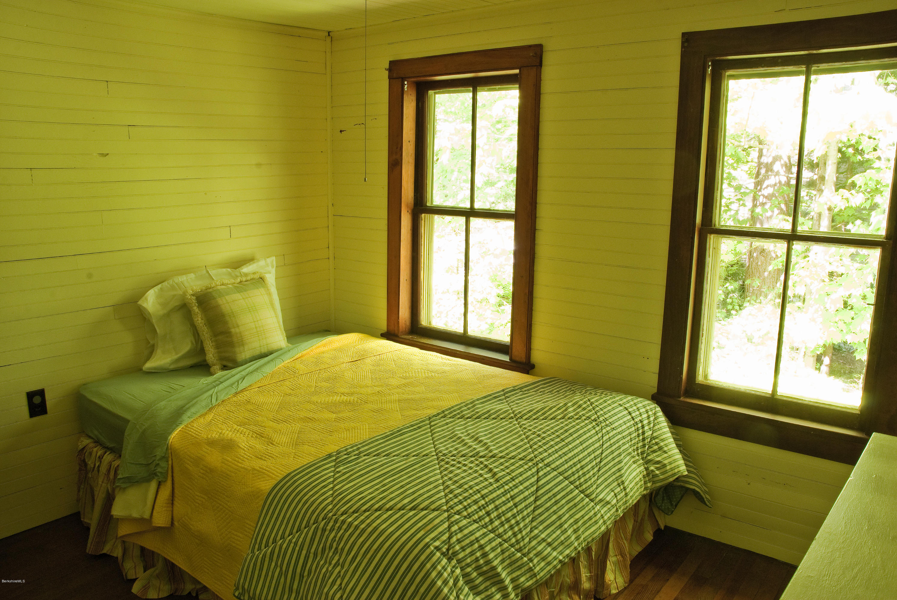 22 Bidwell Road Monterey, MA 01245 - Photo 24 of 46 a bedroom with a bed and a window