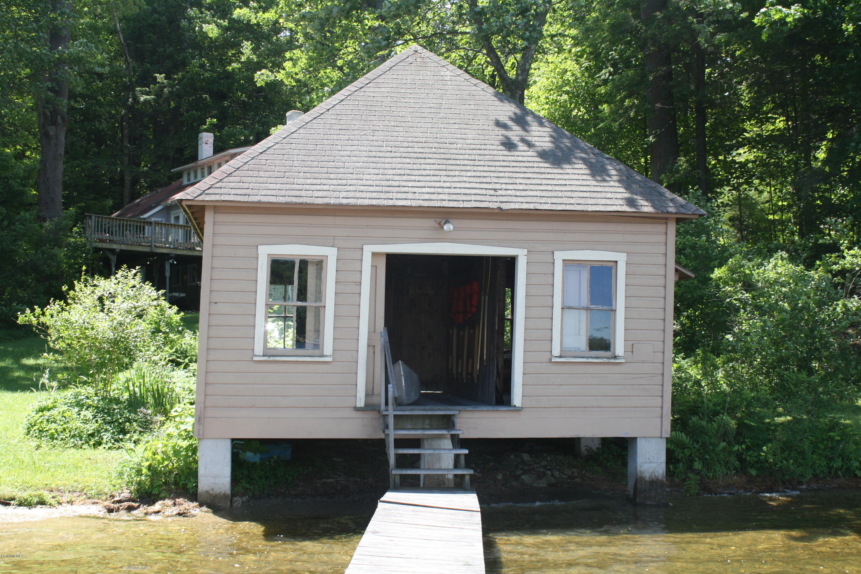 22 Bidwell Road Monterey, MA 01245 - Photo 42 of 46 a front view of a house with a garden