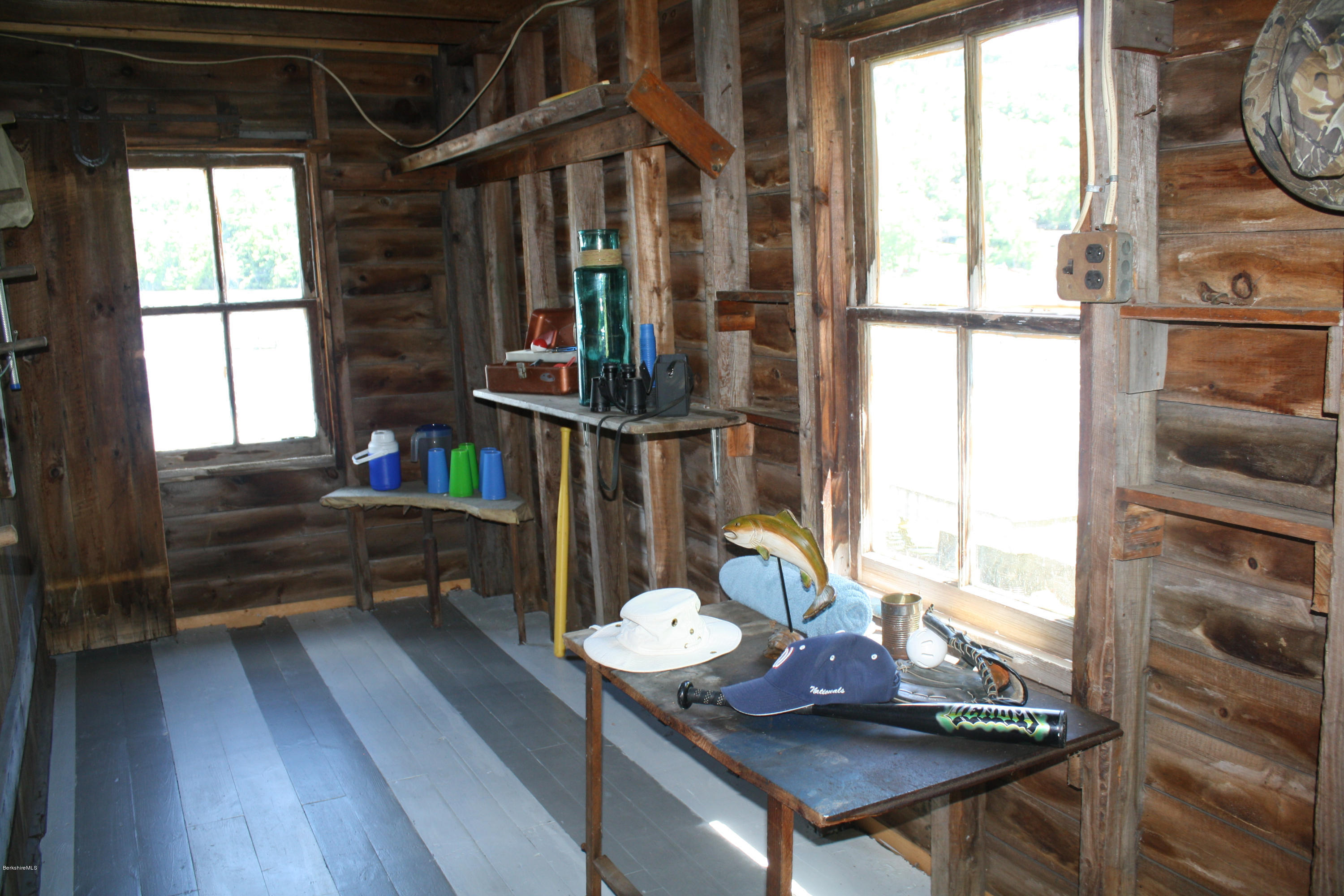 22 Bidwell Road Monterey, MA 01245 - Photo 45 of 46 a view of a dining room with furniture window and outside view