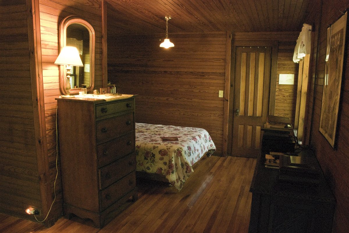 22 Bidwell Road Monterey, MA 01245 - Photo 6 of 46 a bedroom with a bed and a mirror
