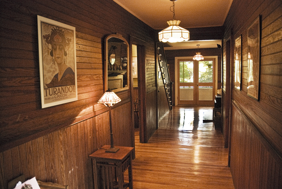 22 Bidwell Road Monterey, MA 01245 - Photo 8 of 46 a hallway with wooden floor chandelier and windows