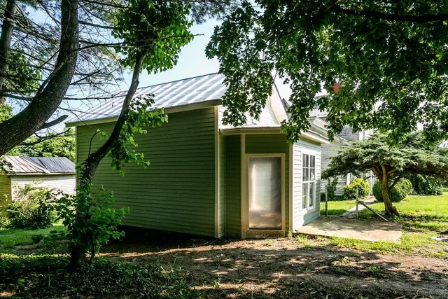 a view of entryway with a fireplace