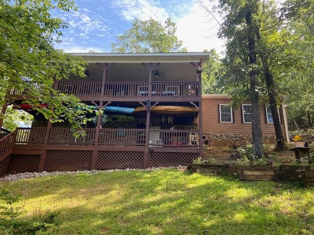 260 Deer Ridge Trail Ocoee, TN 37361 - Photo 2 of 72 a front view of house with yard and trees in the background