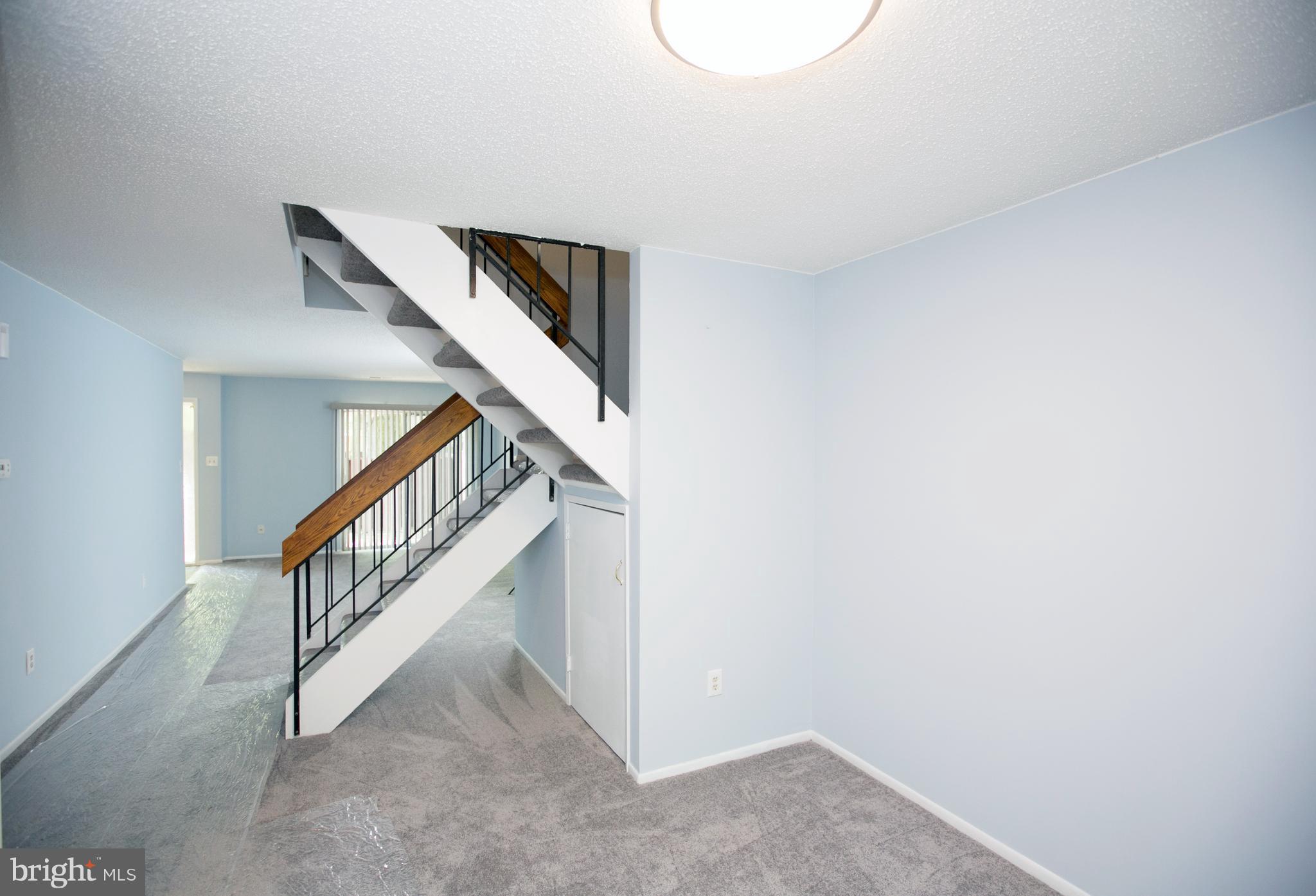2330 Southgate Square Reston, VA 20191 - Photo 12 of 28 a view of a hallway with staircase