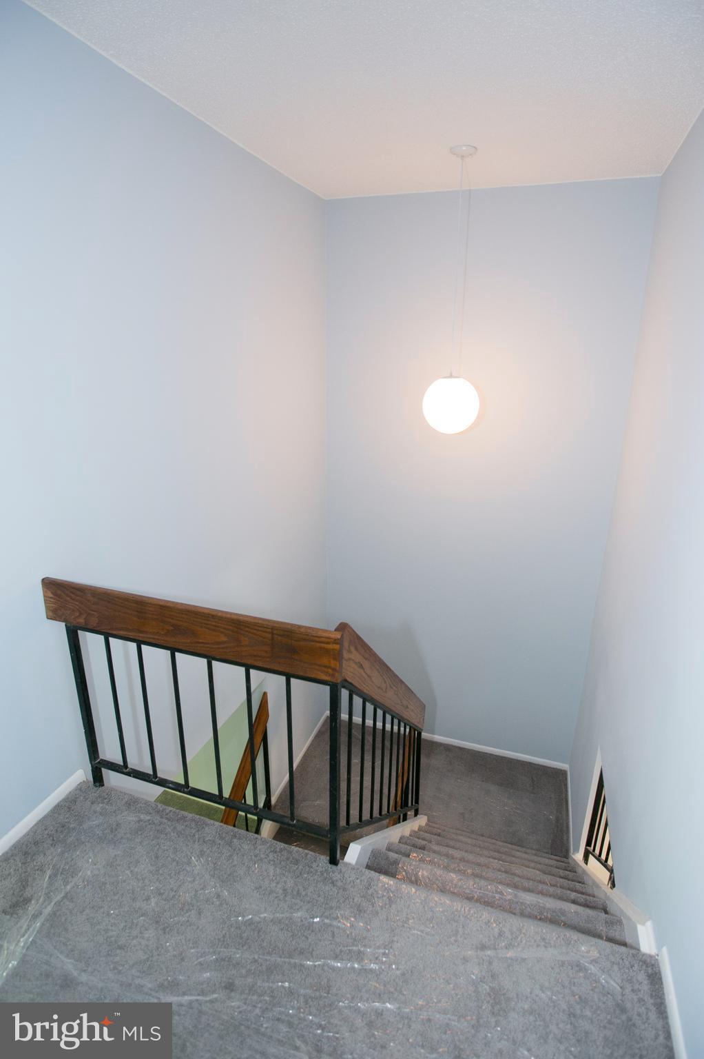 2330 Southgate Square Reston, VA 20191 - Photo 23 of 28 a view of a hallway with staircase