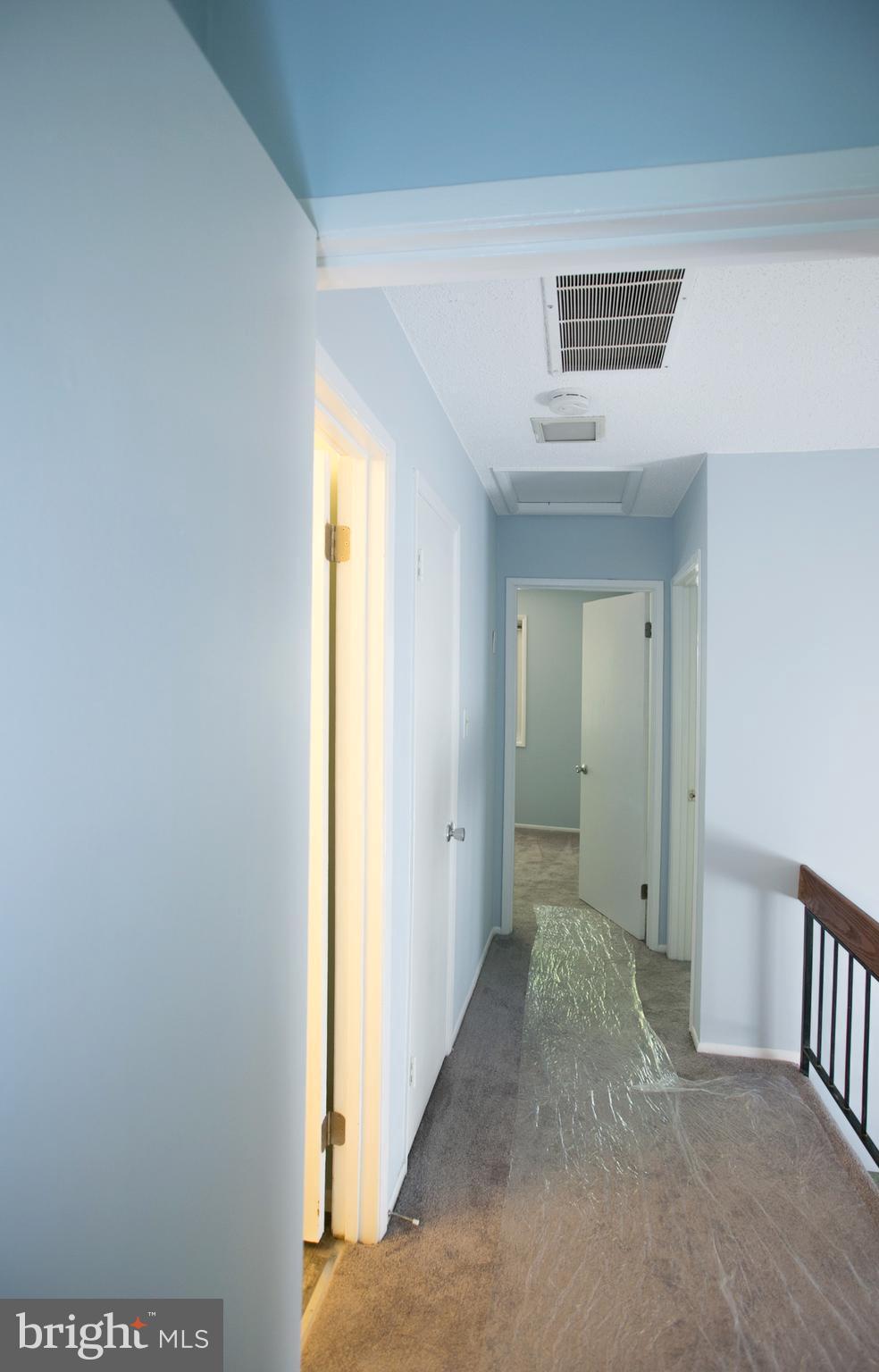 2330 Southgate Square Reston, VA 20191 - Photo 24 of 28 a view of a hallway with a bedroom