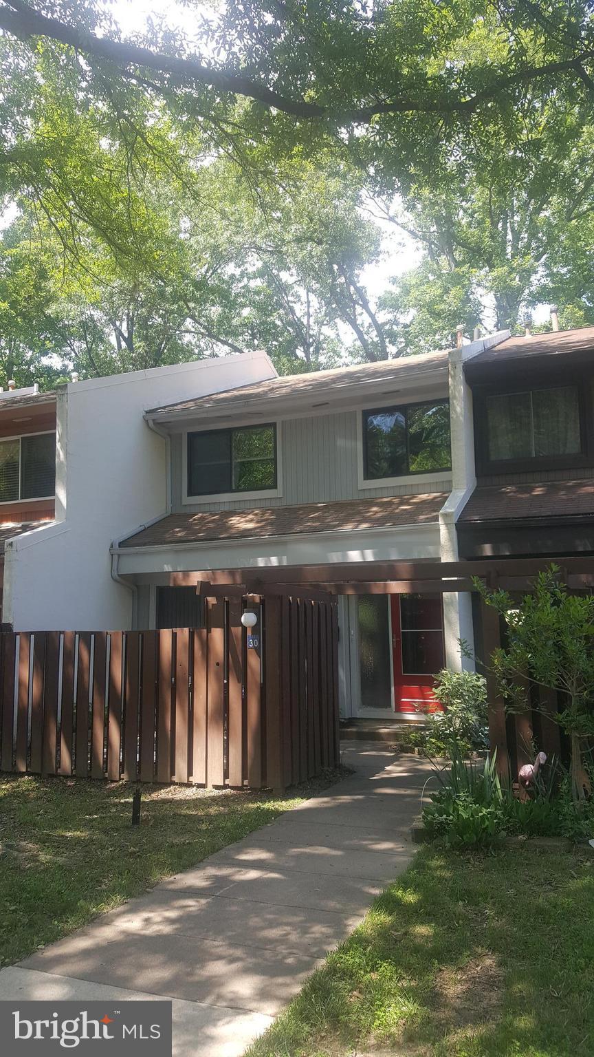 2330 Southgate Square Reston, VA 20191 - Photo 28 of 28 a front view of a house with a yard