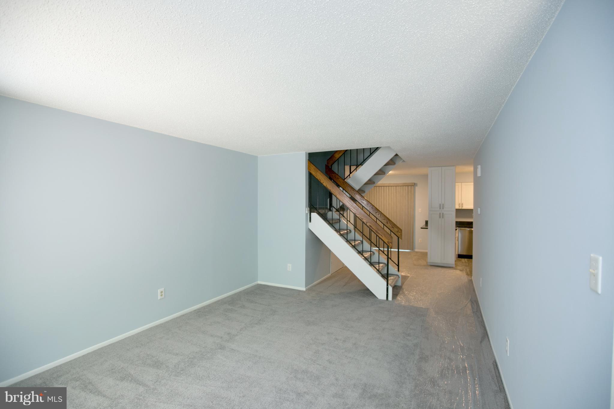 2330 Southgate Square Reston, VA 20191 - Photo 4 of 28 a view of staircase with white walls
