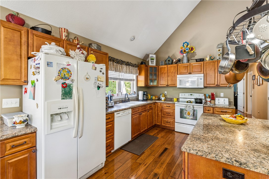 189 Little Choestoea Road Westminster, SC 29693 - Photo 8 of 38 This spacious kitchen offers a functional layout, durable countertops, and ample storage for culinary enthusiasts.