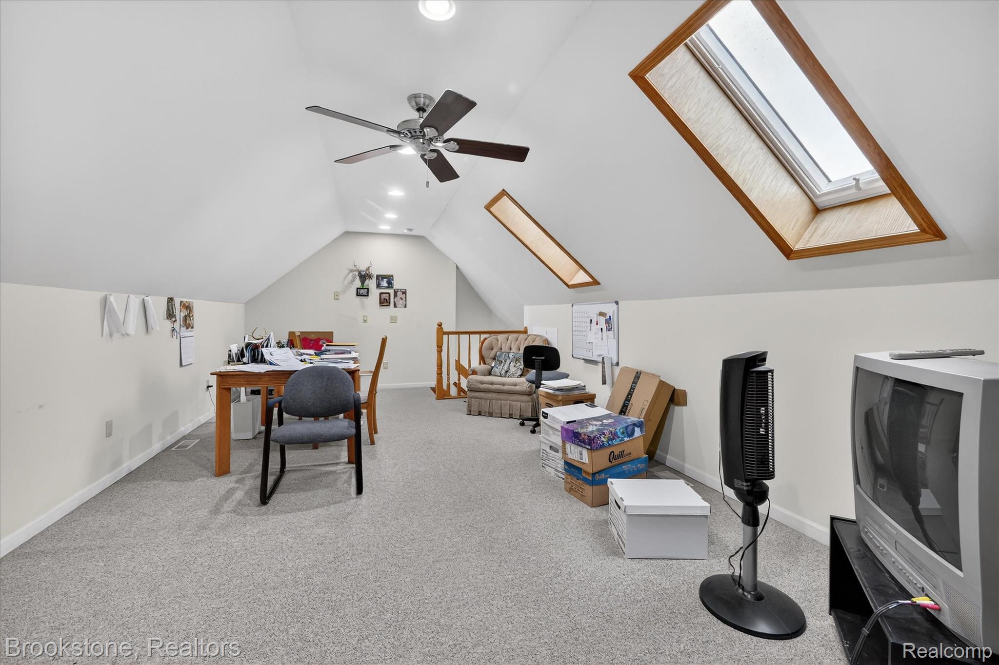 5163 Country Squire Road Dryden, MI 48428 - Photo 41 of 64 Carpeted office space featuring a skylight, vaulted ceiling, and recessed lighting