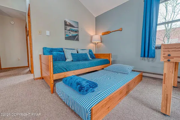 a room with furniture and a window