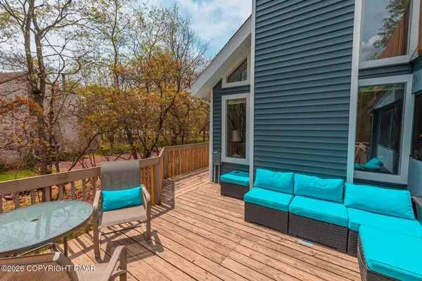 a backyard of a house with seating space