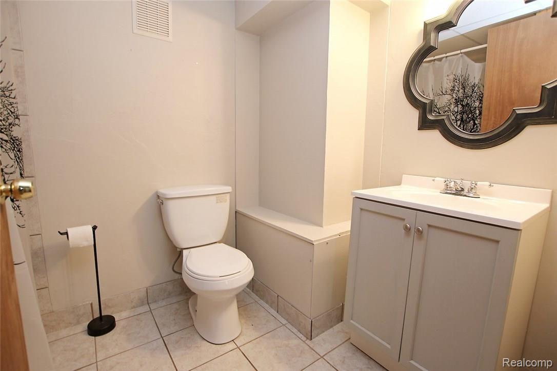 3818 Mels Road Metamora, MI 48455 - Photo 14 of 53 14) Lower Level Bathroom.jpg