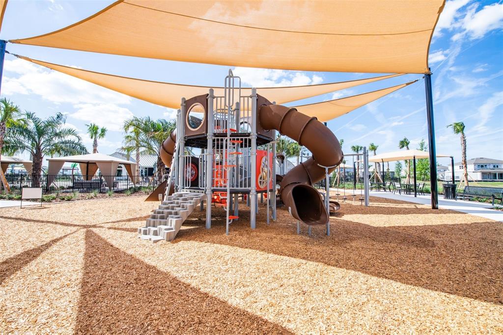 33425 Herds Hallow Way Wesley Chapel, FL 33545 - Photo 27 of 30 a view of a fountain with a patio