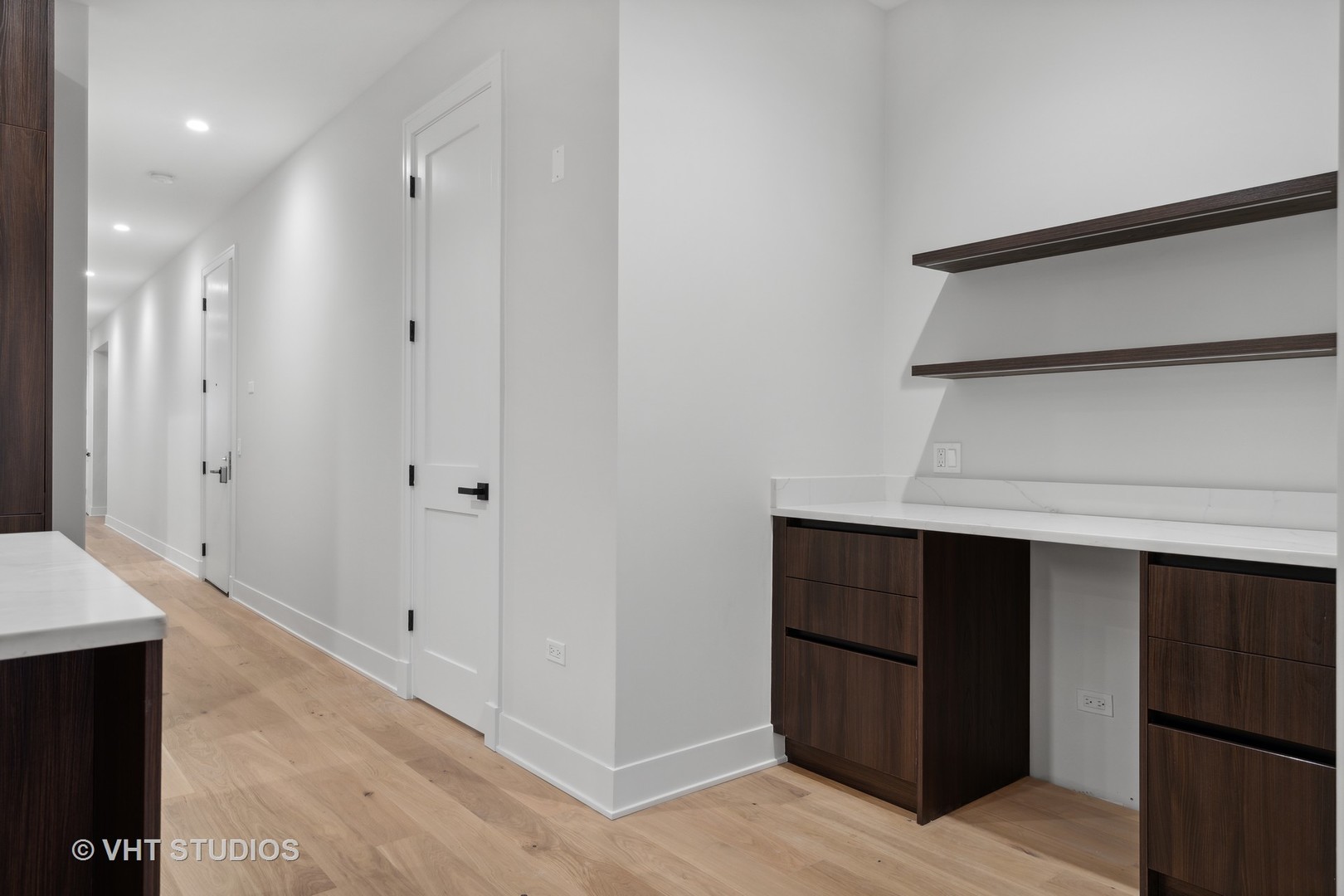 232 South Green Street, Unit 3S Chicago, IL 60607 - Photo 7 of 23 a hallway view with staircase