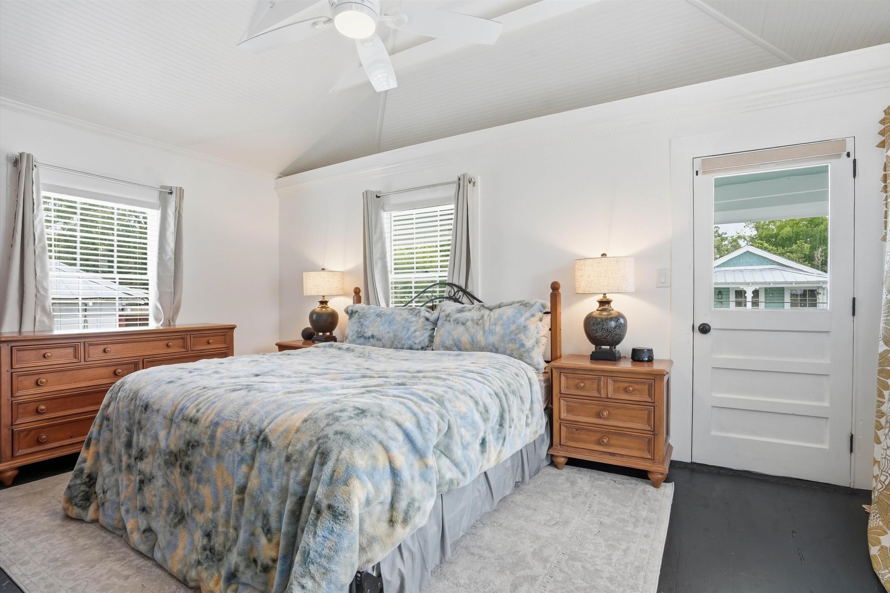 76 Oneida Street St. Augustine, FL 32084 - Photo 20 of 38 a bedroom with a bed and a dresser