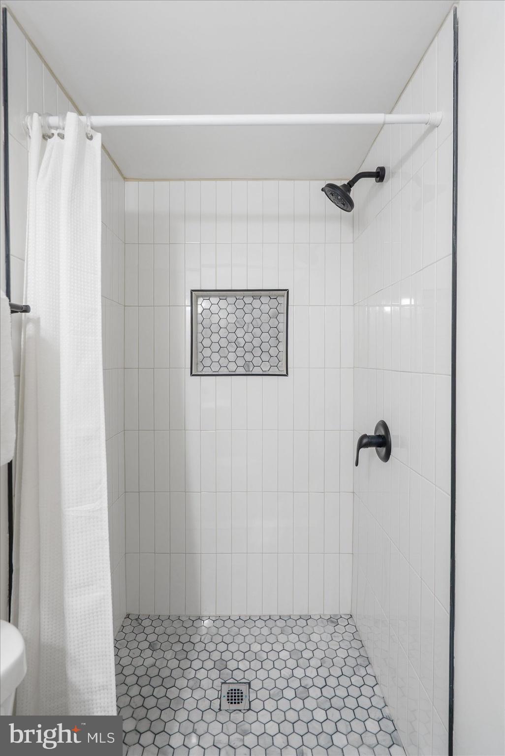 2053 Jasmine Road Baltimore, MD 21222 - Photo 23 of 34 a bathroom with a shower