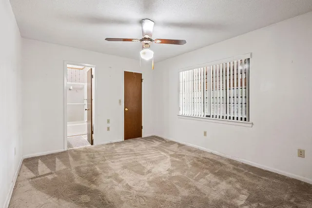 a view of an entryway with a chandelier