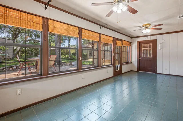 a view of front door with outdoor seating