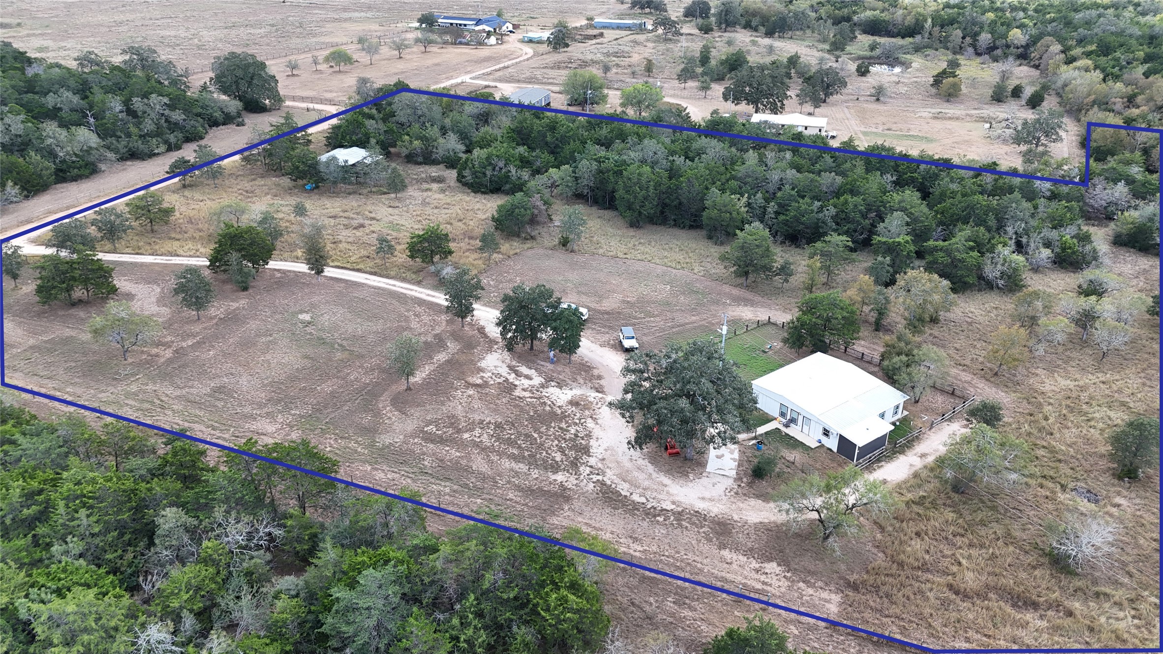 991 Kovar Road, Unit D Flatonia, TX 78941 - Photo 4 of 12 an aerial view of a house with a yard