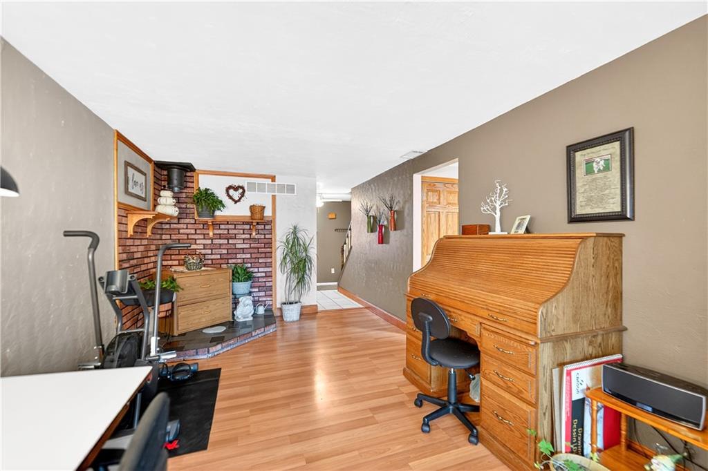 37 Hones Road Export, PA 15632 - Photo 18 of 37 a workspace with furniture and wooden floor