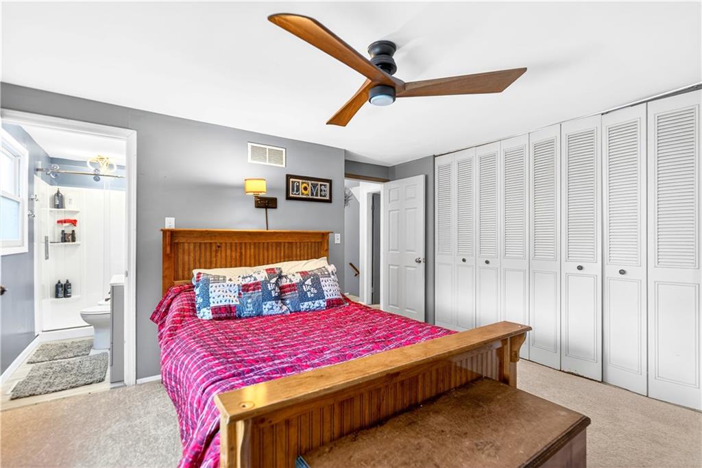 37 Hones Road Export, PA 15632 - Photo 20 of 37 a bedroom with a bed and a mirror