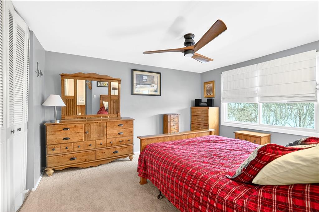 37 Hones Road Export, PA 15632 - Photo 21 of 37 a bedroom with a bed and a dresser