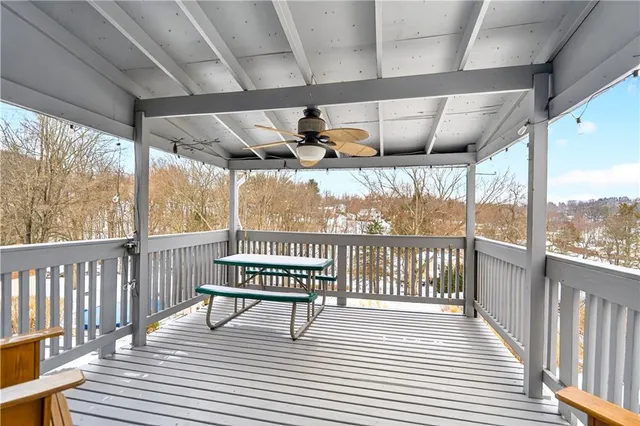 a view of porch with wooden floor
