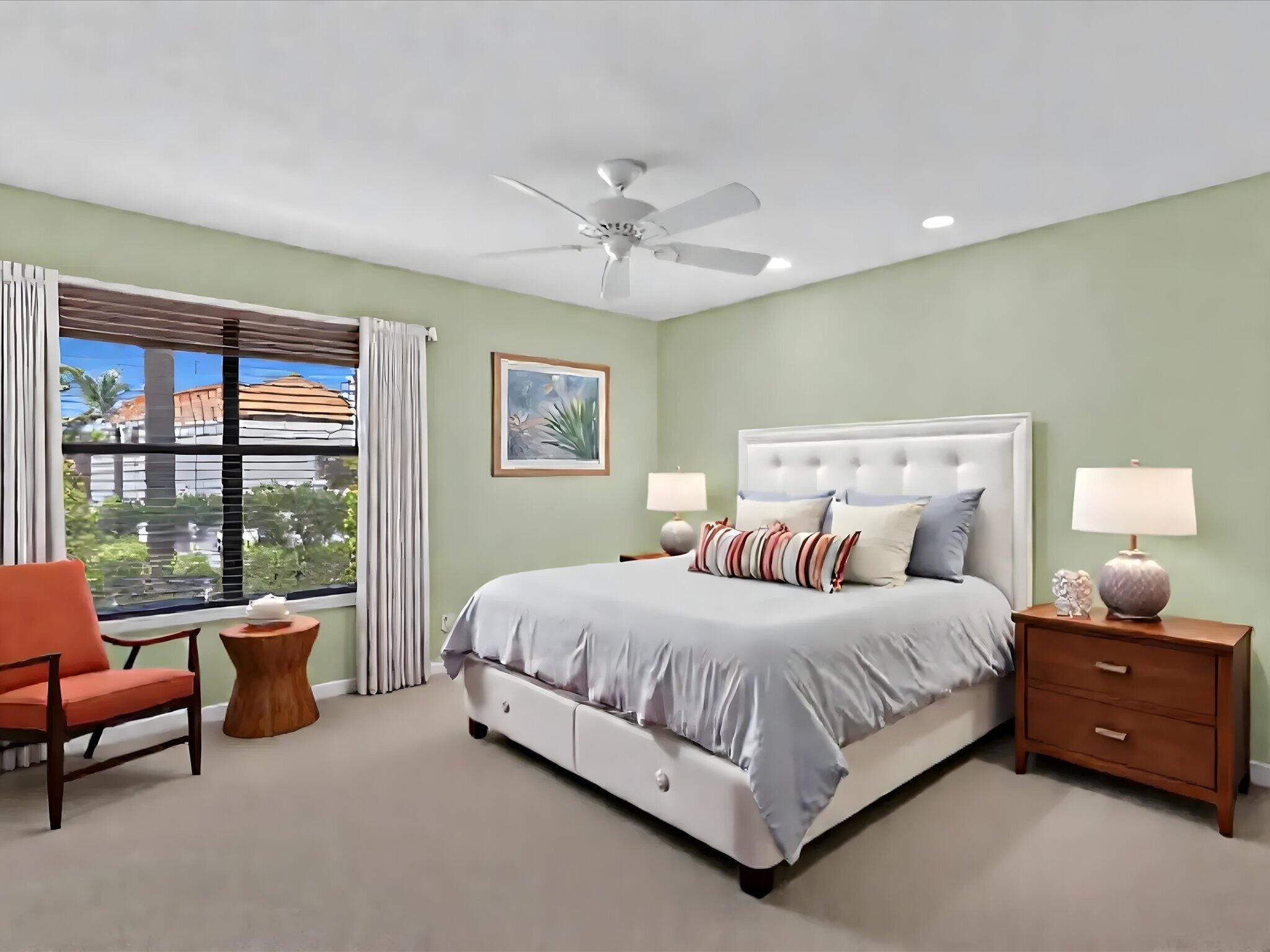 10122 Spyglass Way Boca Raton, FL 33498 - Photo 12 of 65 a bedroom with a bed and a couch