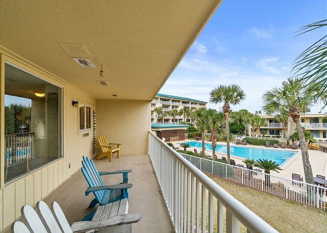 1030 East US Highway 98, Unit 203A Destin, FL 32541 - Photo 26 of 35 a view of swimming pool with outdoor seating