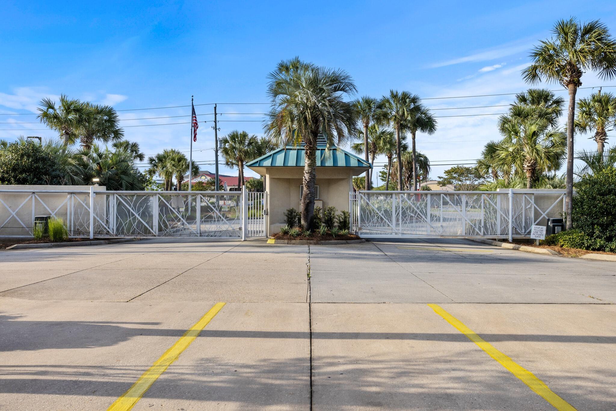 1030 East US Highway 98, Unit 203A Destin, FL 32541 - Photo 30 of 35 a view of a street with a house in the background