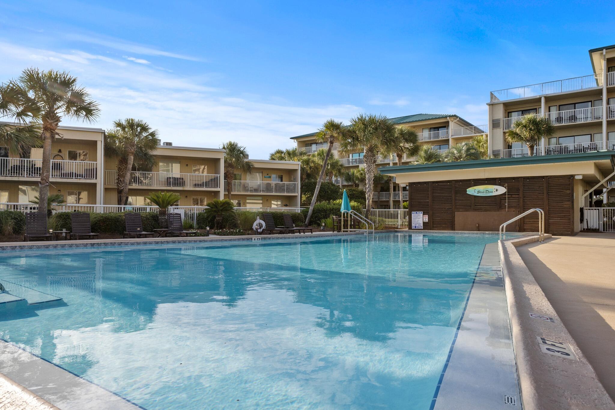 1030 East US Highway 98, Unit 203A Destin, FL 32541 - Photo 31 of 35 a view of a swimming pool with a patio