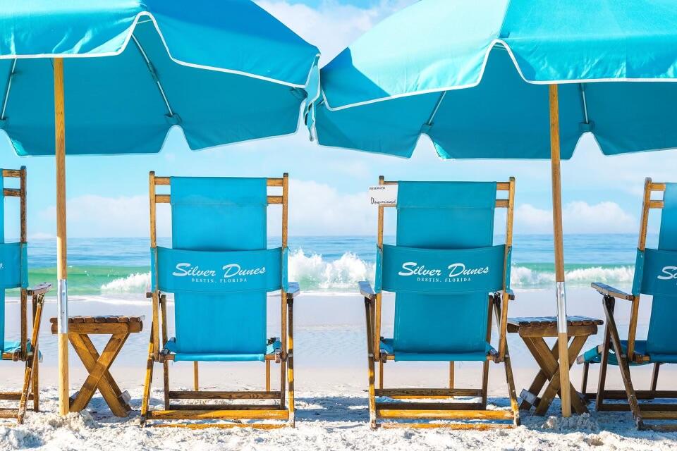 1030 East US Highway 98, Unit 203A Destin, FL 32541 - Photo 4 of 35 a view of dinning table and chairs in the patio