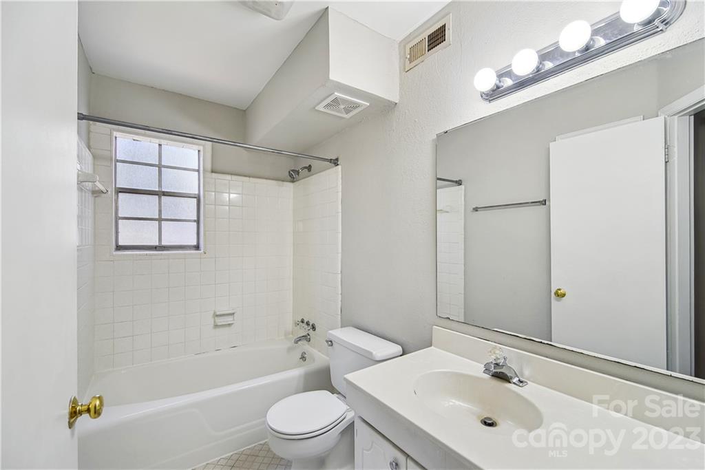 914 McAlway Road Charlotte, NC 28211 - Photo 22 of 44 a bathroom with a sink a toilet and shower