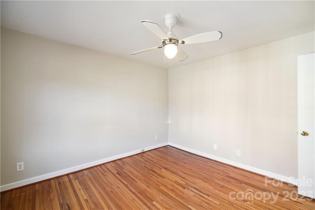 914 McAlway Road Charlotte, NC 28211 - Photo 26 of 44 a view of an empty room with wooden floor
