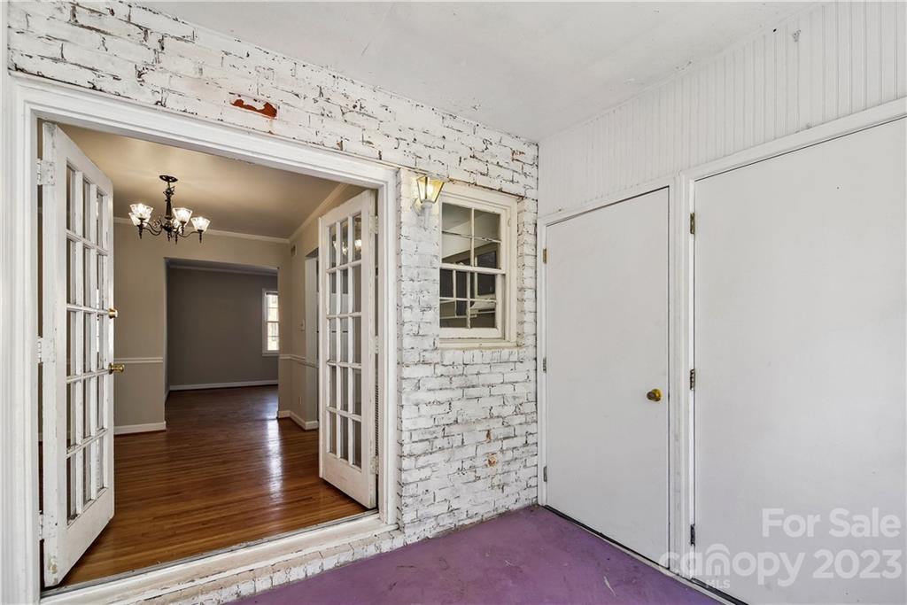 914 McAlway Road Charlotte, NC 28211 - Photo 32 of 44 a view of a hallway with wooden floor and entryway