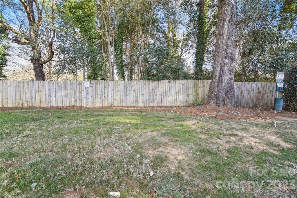 914 McAlway Road Charlotte, NC 28211 - Photo 44 of 44 a view of backyard of a house with wooden fence