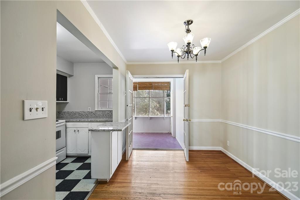 914 McAlway Road Charlotte, NC 28211 - Photo 10 of 44 wooden floor in an empty room with a window