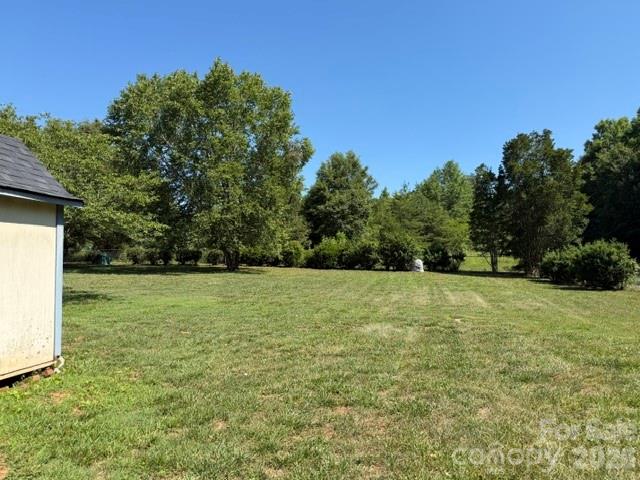 4084 Carpenters Cove Road Claremont, NC 28610 - Photo 24 of 27 a view of a field with trees