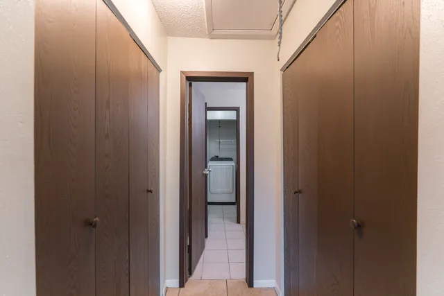 a view of a bathroom from a hallway