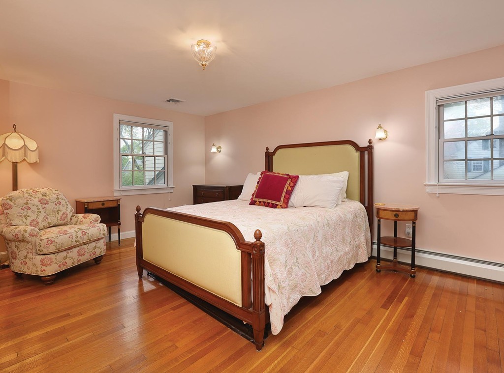 26 Rowena Road Newton, MA 02459 - Photo 7 of 9 a bedroom with bed and window