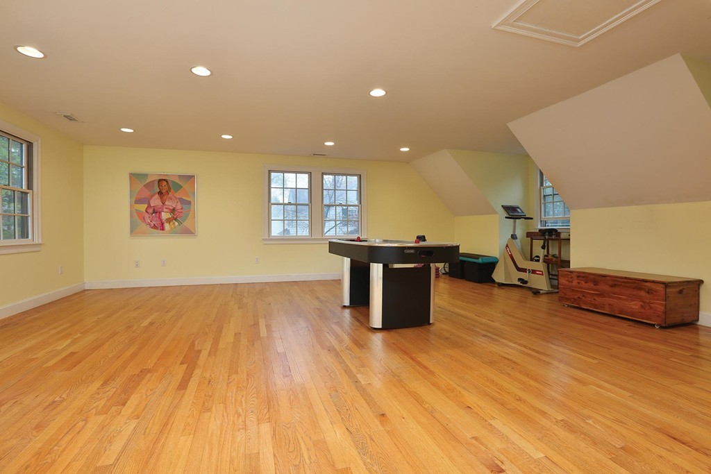 26 Rowena Road Newton, MA 02459 - Photo 8 of 9 a view of a kitchen with a sink and a microwave