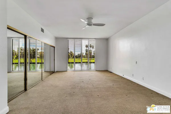 en empty room with windows