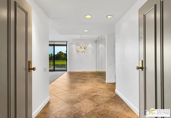 a view of entryway with bathroom