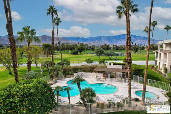 a view of a lake with a sitting area