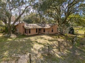 651 Old Haw Creek Road Bunnell, FL 32110 - Photo 24 of 28 a front view of a house with a yard