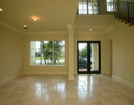 335 Northeast 4th Street Boca Raton, FL 33432 - Photo 3 of 16 a view of an empty room and window