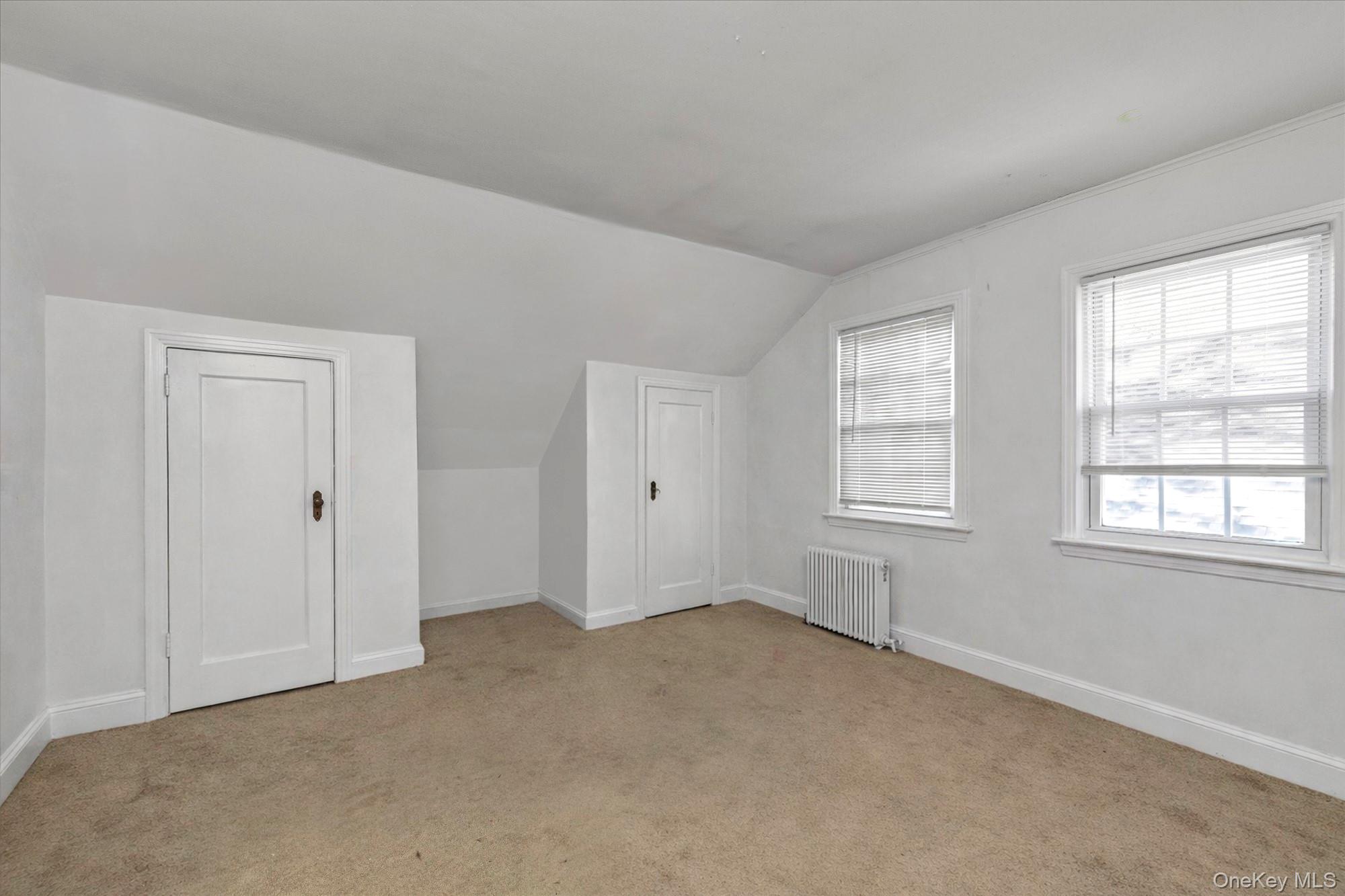 81 Stuart Street Lynbrook, NY 11563 - Photo 18 of 23 an empty room with windows