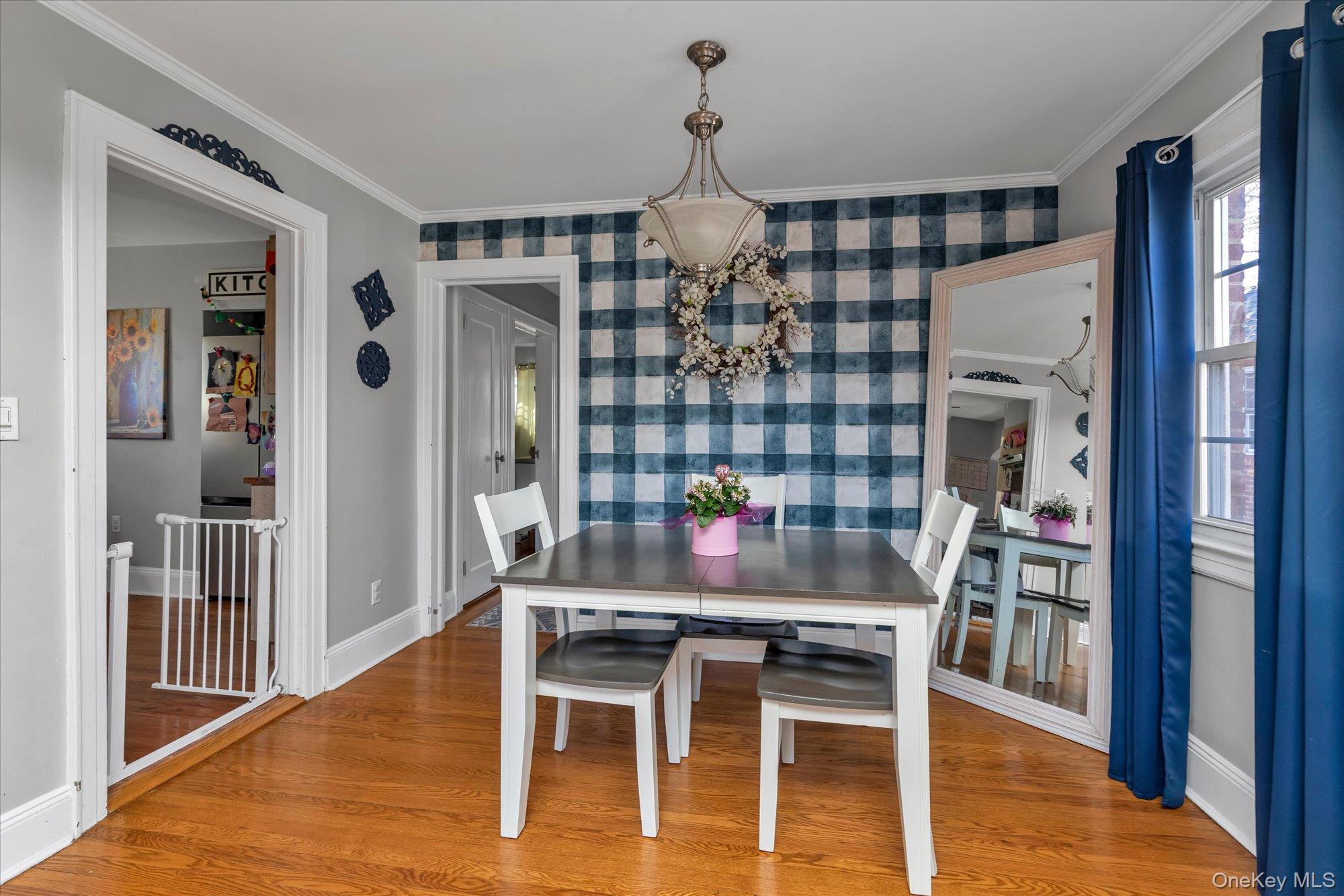 81 Stuart Street Lynbrook, NY 11563 - Photo 6 of 23 a dining room with furniture and wooden floor